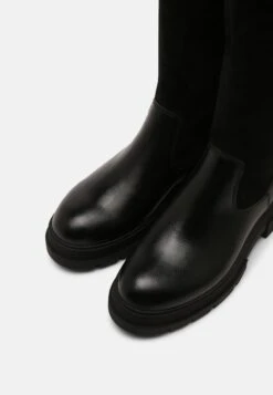 Marco Tozzi Cuissardes - Black 11 Marco Tozzi Cuissardes - Black -Chaussures Élégance Vente de019232629a4e84aeaf77349da48439